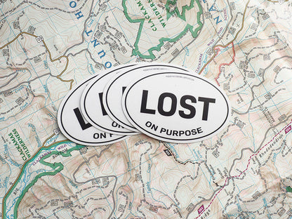 Lost on Purpose White Oval Bumper Sticker - 3" & 4"