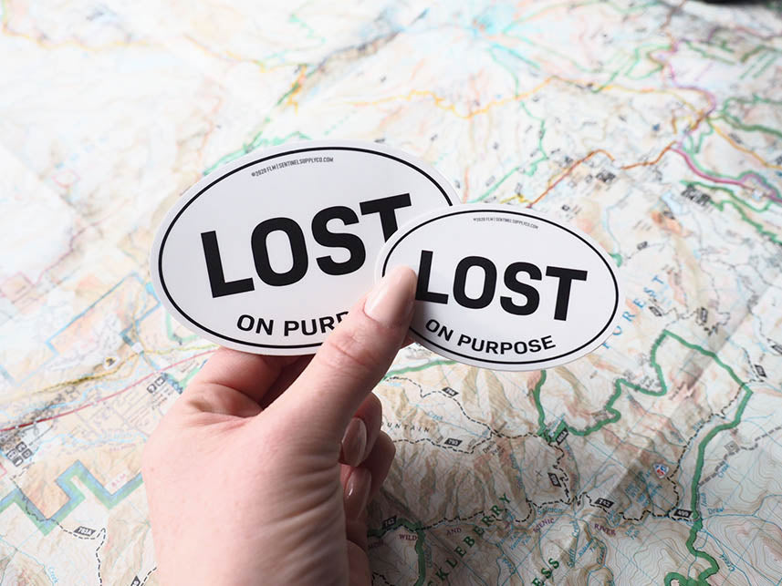 Lost on Purpose White Oval Bumper Sticker - 3" & 4"